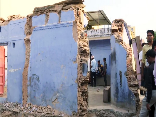Visual of a temple demolished using bulldozers in Alwar, Rajasthan (Photo/ANI)