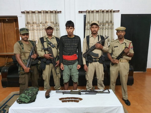 An ULFA (I) activist arrested with cache of arms in Tinsukia on Friday. Photo/ANI An ULFA (I) activist arrested with cache of arms in Tinsukia on Friday. Photo/ANI