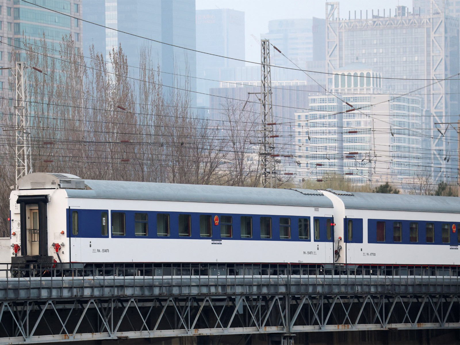 A passenger train with cross-border service to North Korea's Pyongyang leaves Beijing Railway Station in Beijing, China March 12, 2026. (Photo/Reuters)