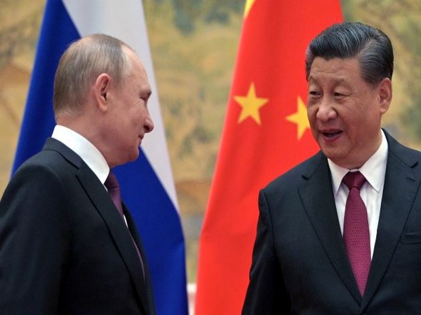 Russian President Vladimir Putin with Chinese President Xi Jinping. (Photo Credit - Reuters)