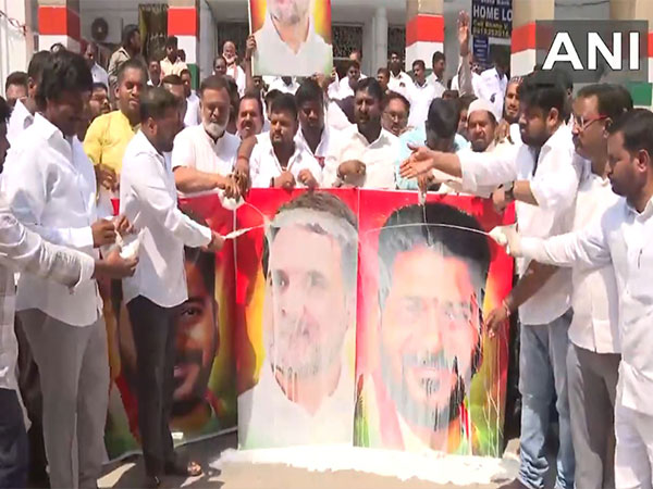 Congress workers celebrate, distribute sweets, pour milk over Rahul Gandhi, CM Revanth Reddy's posters (Photo/ANI)