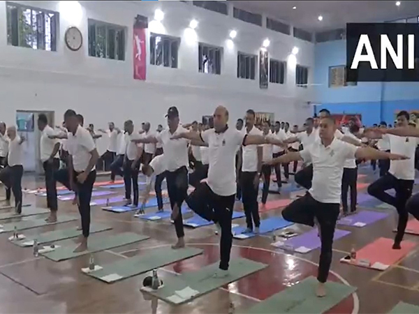 Defence Minister Rajnath Singh takes part in International Yoga Day celebrations (Photo: ANI)