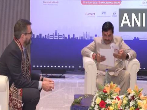 Madhya Pradesh Chief Minister Mohan Yadav meets Pau Abello Pellicer, Senior Managing Director of Institutional Relations at Roca Group, in Barcelona to explore investment opportunities (Photo/ANI)