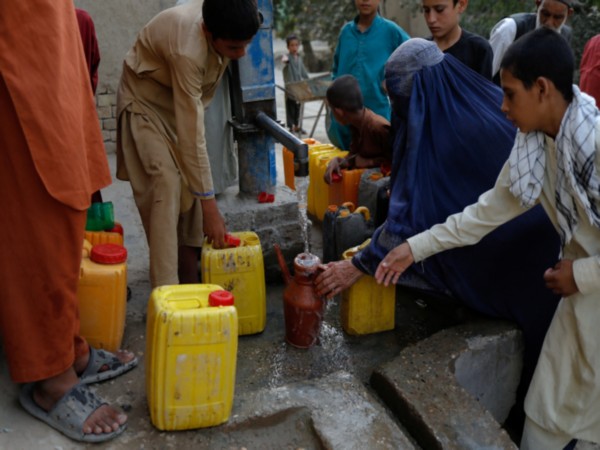 Residents in Kabul collect water amid severe shortages as UN warns six million are at risk due to the city's worsening water crisis (Source: Reuters)