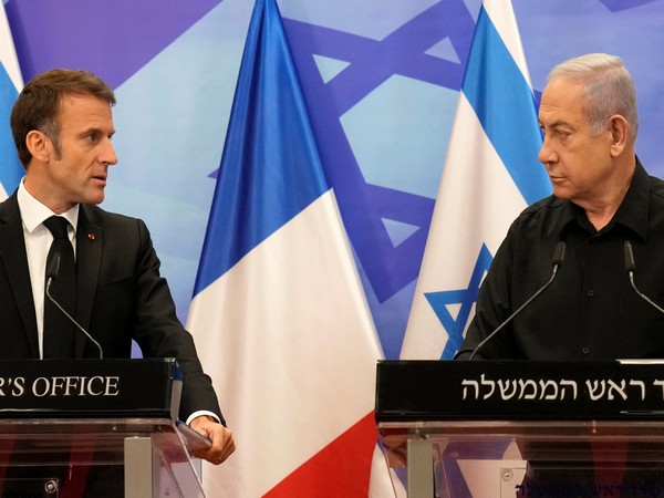 French President Emmanuel Macron (on left) and  Israeli Prime Minister Benjamin Netanyahu (on right) (Source: Reuters)