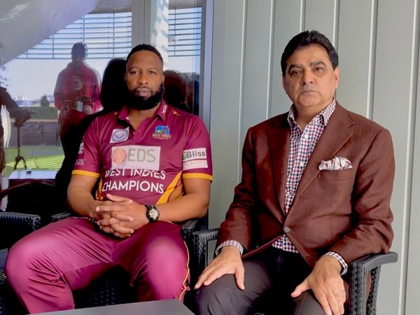 Former West Indies captain Kieron Pollard with West Indies Champions owner Ajay Sethi (Photo: ANI)