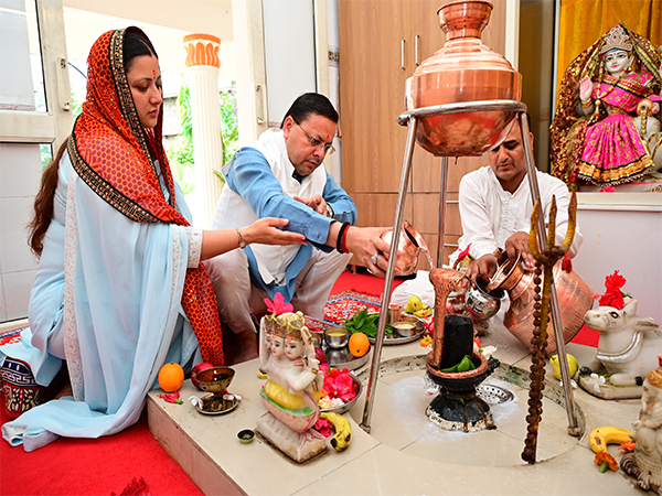 Uttarakhand CM Pushkar Singh Dhami, along with his wife Geeta Dhami (Photo/ANI)