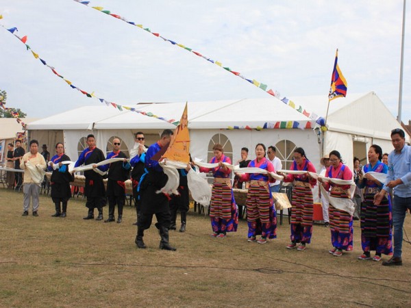 Tibetan community in Belgium celebrates Shoton Festival in Ostend with cultural performances, traditional attire, and tributes marking the Dalai Lama's 90th birthday (Image: X/@CTA_TibetdotNet)