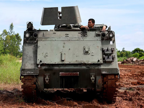 A Thai soldier sits inside an Armoured Personnel Carrier (APC) near the Thailand-Cambodia border in Sisaket province, Thailand (Photo/Reuters)