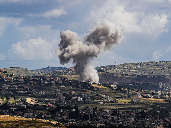 Plumes of smoke billow over Lebanese territory after an Israeli airstrike, during continued cross-border clashes between Israeli forces and Hezbollah, seen from Israel's northern border on May 5, 2024 (File Photo/Reuters)