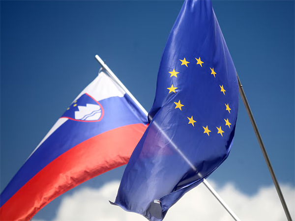 European Union and Slovenian flags seen fluttering in Medvode, Slovenia, ahead of Slovenia's EU presidency on June 30, 2021 (File Photo/Reuters)