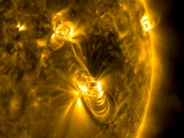 Medium-sized (M2) solar flare and a coronal mass ejection  (Photo/ Reuters)