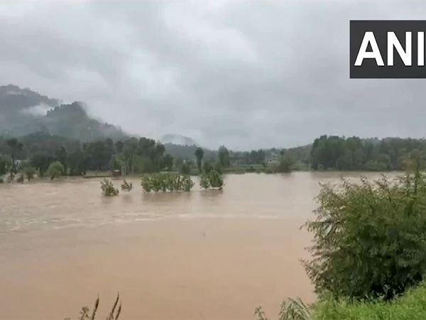 Rivers overflow as the district continues to struggle with heavy rainfall and cloud bursts. (Photo/ANI)