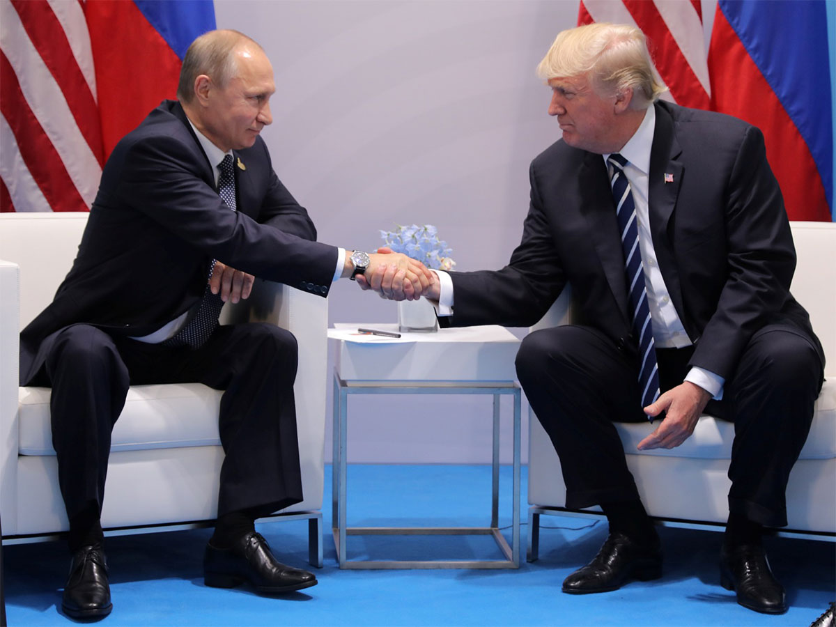A 2017 file photo of Vladimir Putin with Donald Trump at the G20 summit in Hamburg. (File Photo/Reuters)