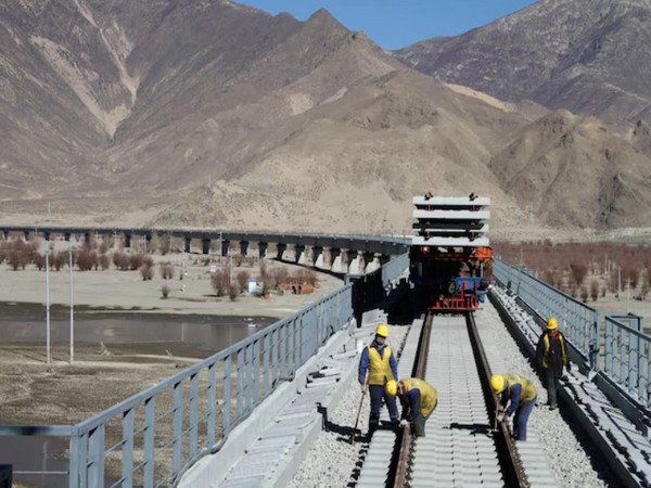 Workers seen on railway tracks at a bridge over Yarlung Tsangpo (File photo/ Reuters)