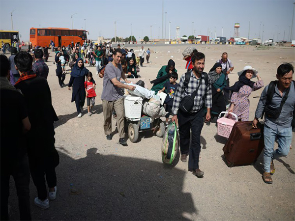 Afghan nationals deported from Iran seen arriving at a returnees' camp near the Islam Qala border crossing in Herat province, Afghanistan (File Photo/Reuters)