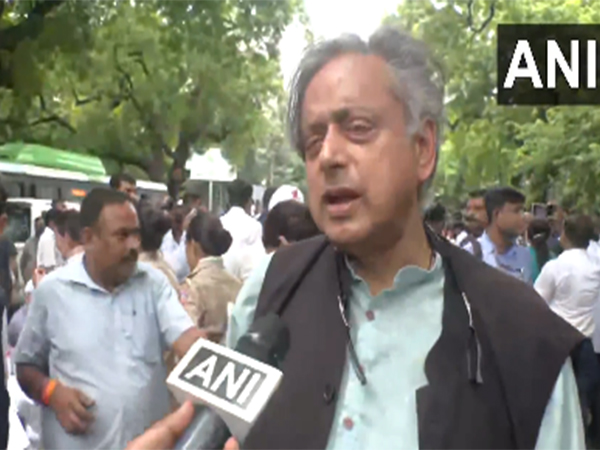 Congress MP Shashi Tharoor at INDIA bloc march (Photo/ANI)
