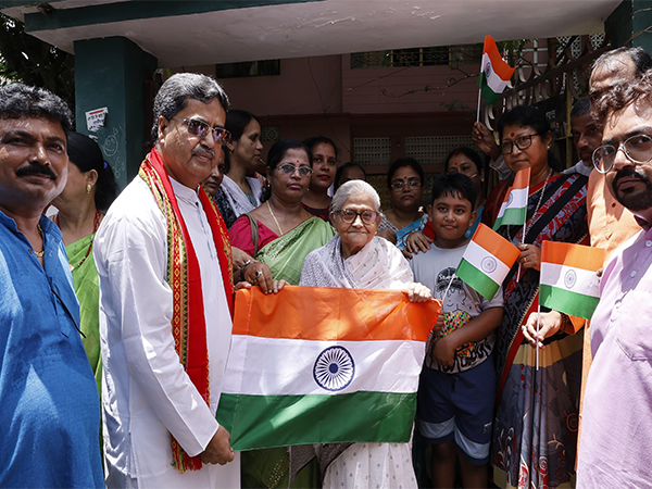 Tripura CM Manik Saha during door-to-door campaign for the Har Ghar Tiranga program. (Photo/ANI)