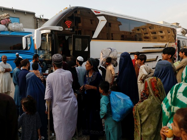 Afghan nationals gather near a bus as part of ongoing repatriation efforts amid a crackdown on undocumented residents in Quetta division, Pakistan (File Photo/Reuters)