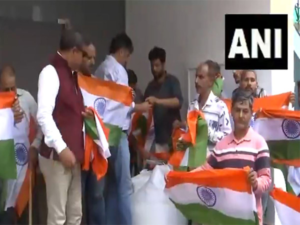 Doda District administration distributes 1 lakh national flags under 'Har Ghar Tiranga' Campaign (Photo/ANI)