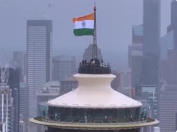 Indian flag raised atop Seattle's Space Needle for India's 79th Independence Day, with Consul General of India, Mayor Bruce Harrell, and dignitaries witnessing the historic occasion (Source: Consulate General of India, Seattle)