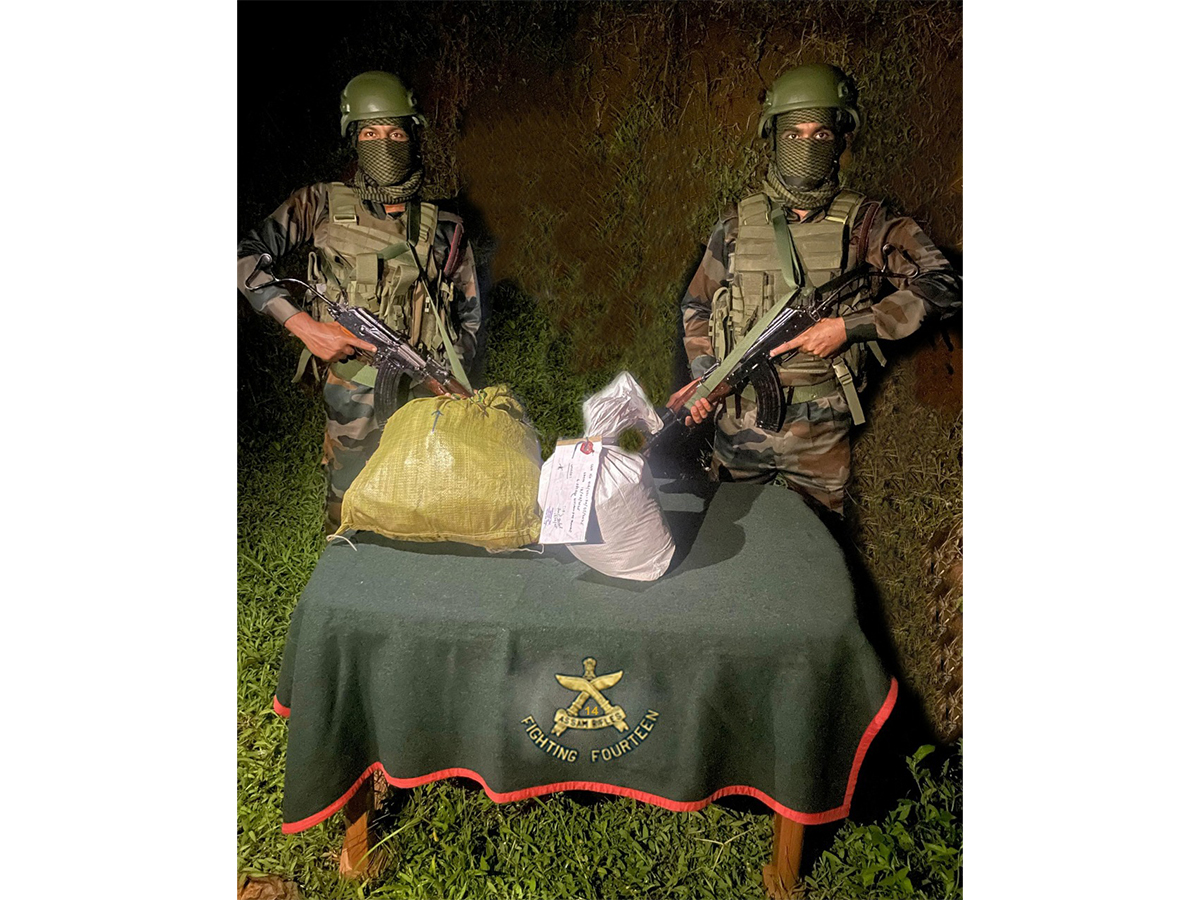 Assam Rifles with the seized Methamphetamine tablets. (Photo/ANI)