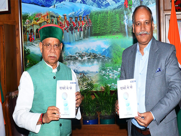 Himachal Pradesh Governor Shiv Pratap Shukla releasing 'Dairon Se Pare' (Photo/Himachal Pradesh Raj Bhavan)