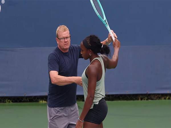 Coco Guf with coach Matt Daly (Photo:)