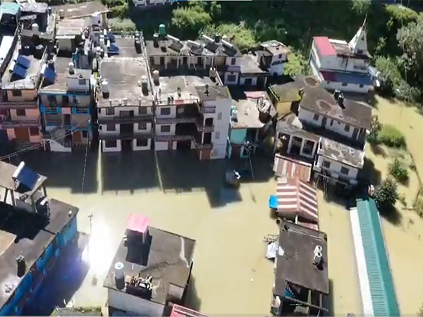 Water reaching the residential area due to the lake formation (Photo/ANI)