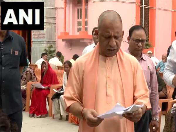 UP CM Yogi Adityanath addresses public grievances at 'Janta Darshan' (Photo/ANI)