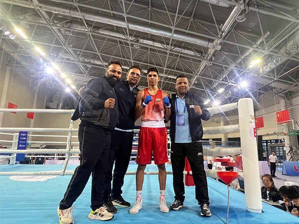 Ritesh celebrates his win in 57kg (Photo: BFI)