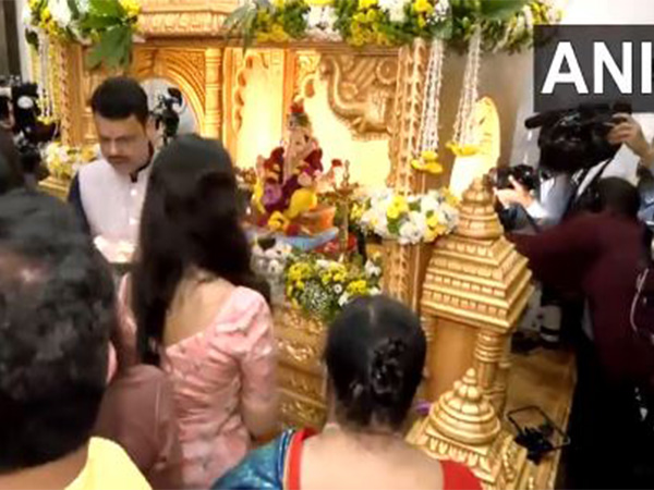 Maharashtra CM Devendra Fadnavis and wife Amruta perform Ganesh Aarti at 'Varsha' on Ganesh Chaturthi (Photo/ANI) 