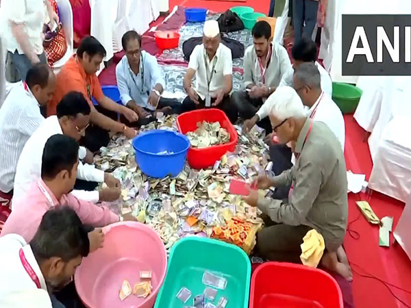 Visuals of people counting donations received on Day 1 of Ganesh Chaturthi festival (Photo: ANI)