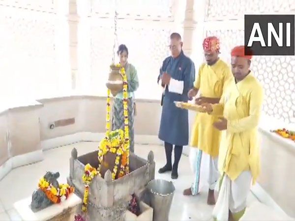 Bhutan Prime Minister Tshering Tobgay and his spouse Aum Tashi Doma offer prayers during their visit to the Shri Ram Janmbhoomi Temple (Photo/ANI)