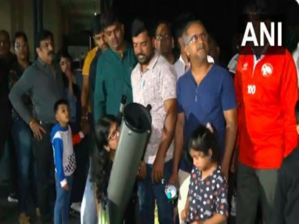 People watching Total Lunar Eclipse in Bengaluru (File Photo/ANI)