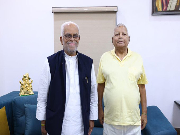 VP candidate B Sudarshan Reddy with Lalu Yadav (Photo/@amitmalviya)