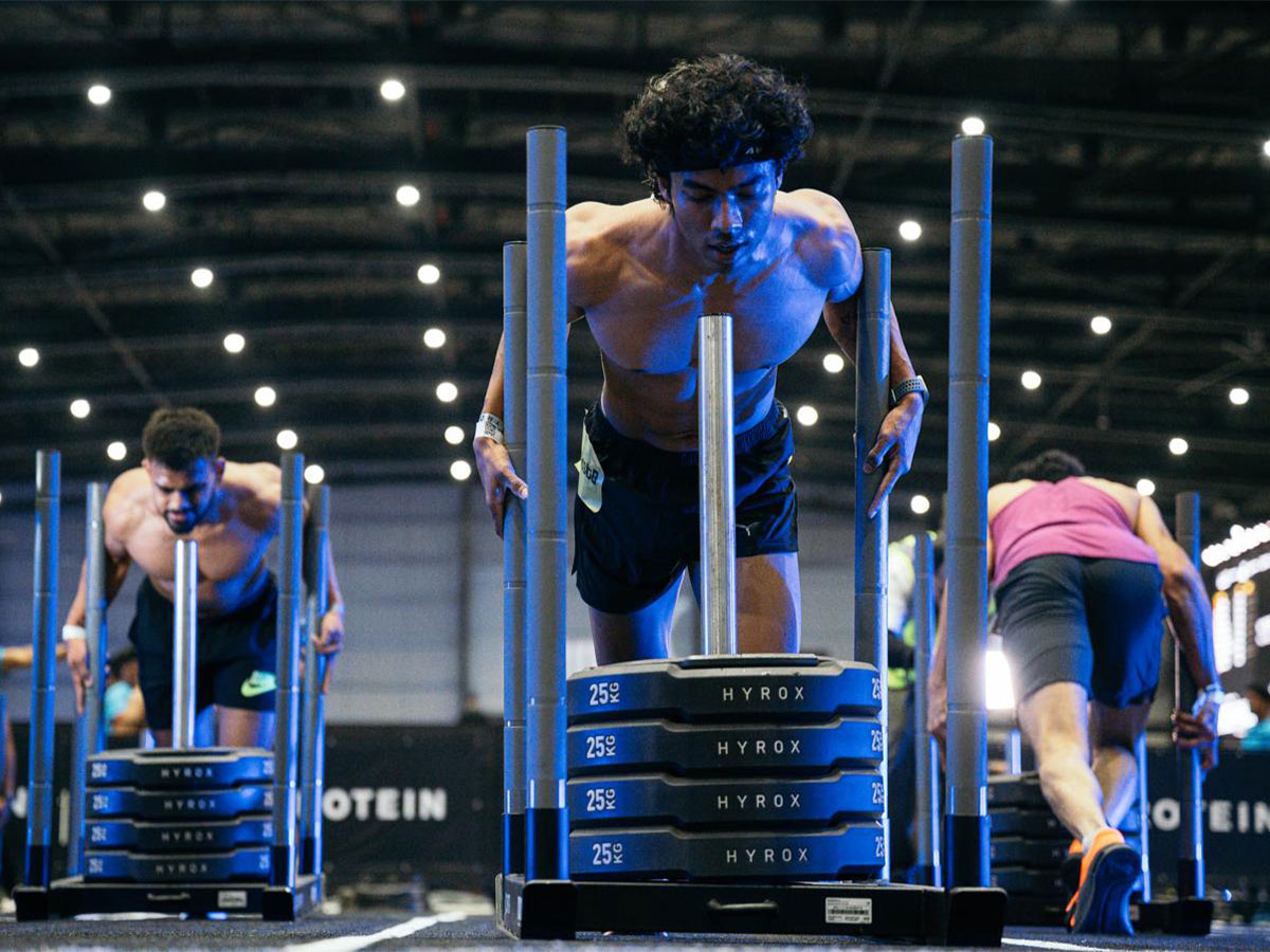 Athletes in acition during HYROX event. (Photo/ HYROX)