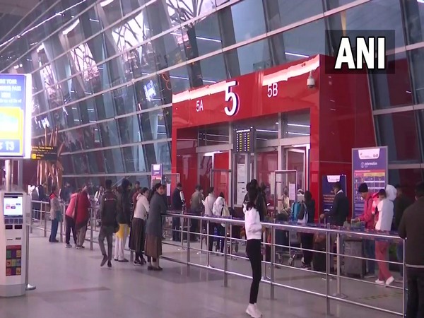 People in line to check in at Delhi airport (Photo/ANI)