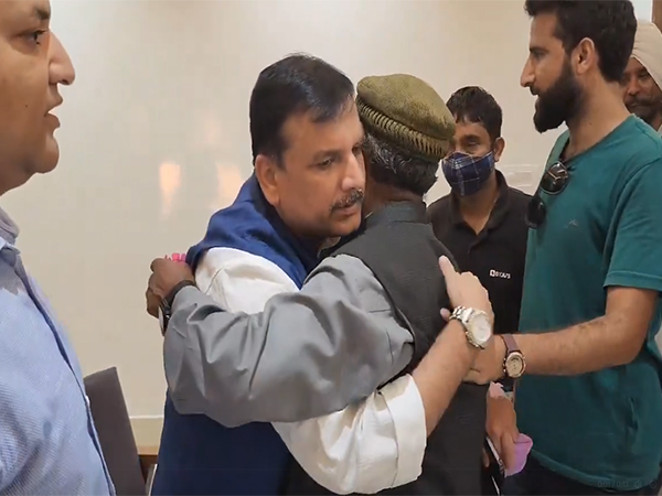 AAP leader Sanjay Singh meets Mehraj Malik's family in Jammu. (Photo/ANI)