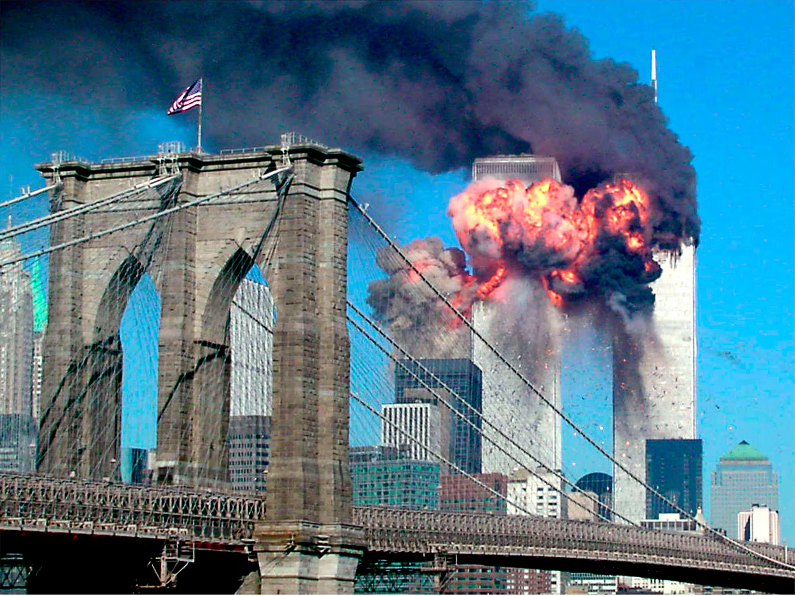 The second tower of the World Trade Center bursts into flames after being hit by a hijacked airplane, September 11, 2001. (Photo/Reuters)