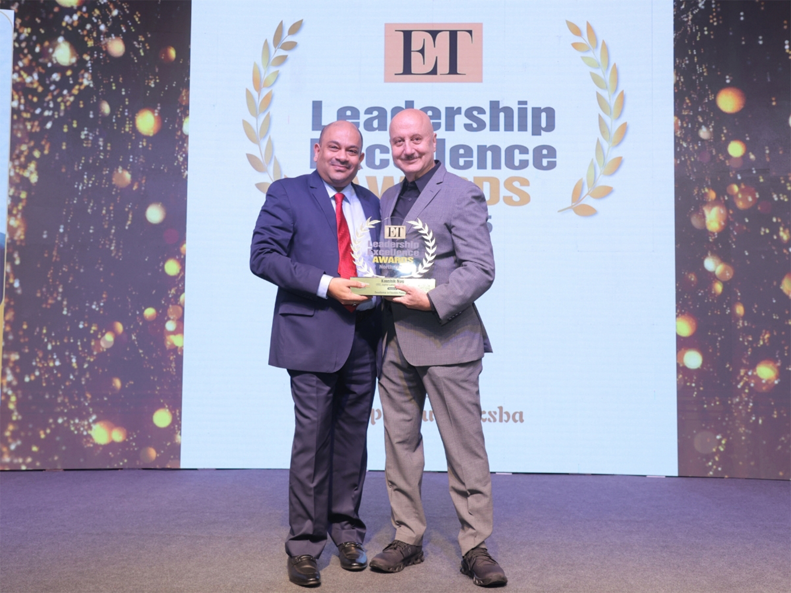 Kaushik Nag, CEO of Jupiter Laminators Pvt. Ltd. felicitated by Anupam Kher at the ET Leadership Excellence Awards 2025 event in New Delhi
