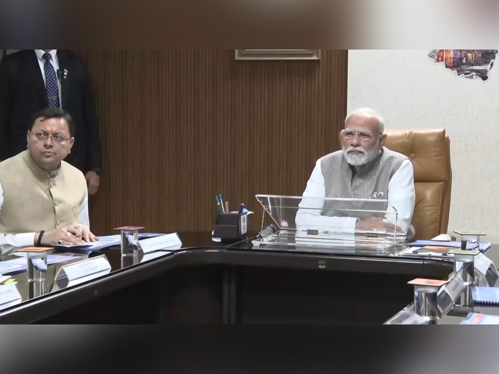 Prime Minister Narendra Modi (right)and Uttarakhand CM Pushkar Singh Dhami (left) (Photo/ANI)