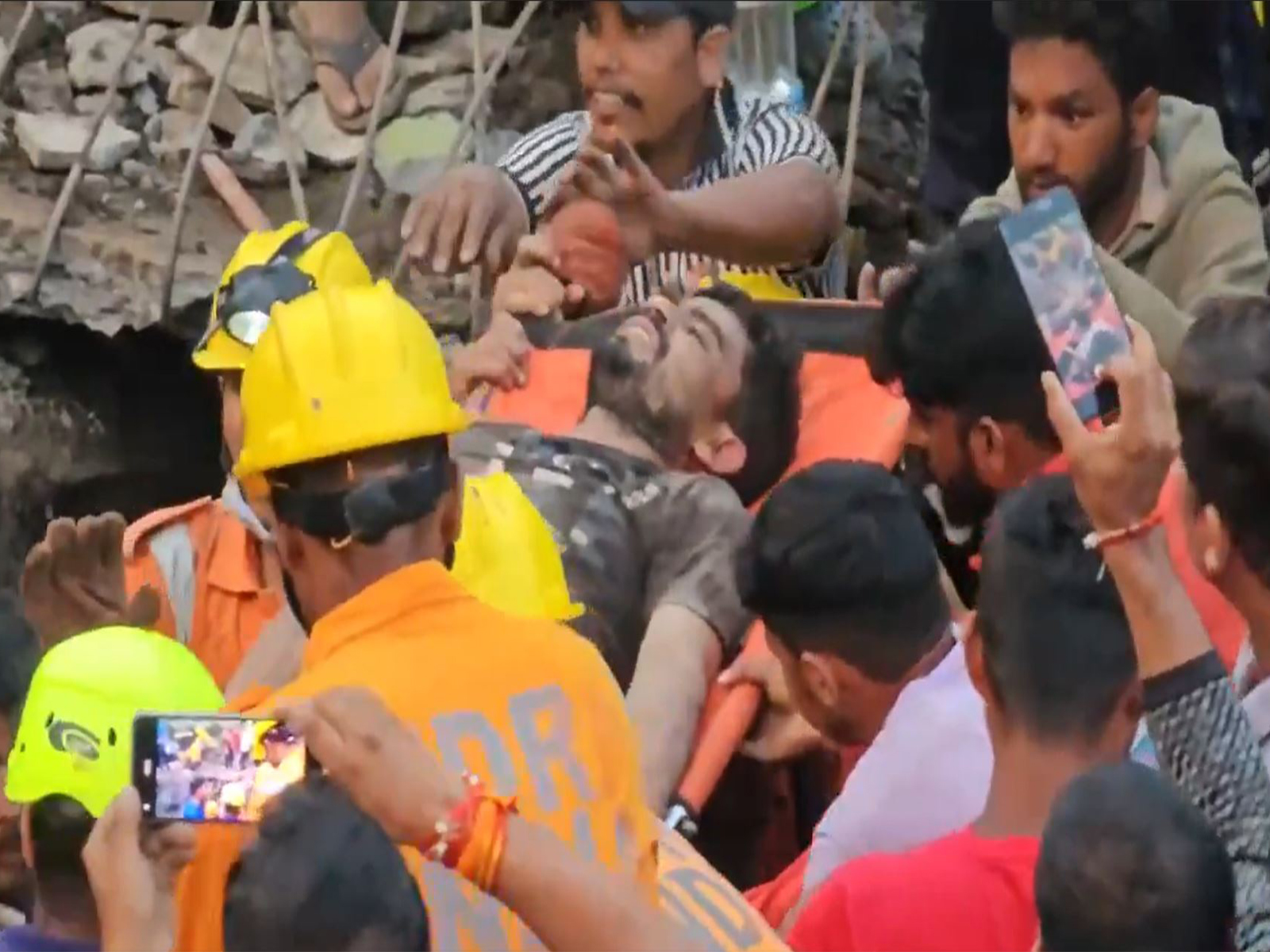 Rescue officials saves man trapped under debris for 16 hours (Photo/X/@chamolipolice)