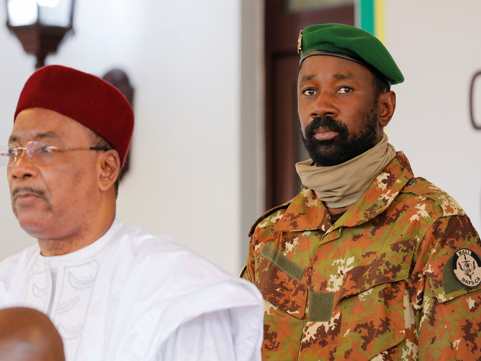 Mali's ties with France have strained since Assimi Goita, right, seized power in a coup four years ago (File Photo/Reuters)
