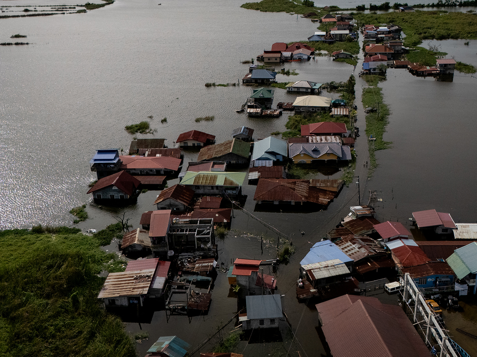A drone view shows homes inundated by high tide and flooding brought by Typhoon Co-may in Calumpit, Bulacan, Philippines in  July 25, 2025. (File Photo/Reuters)