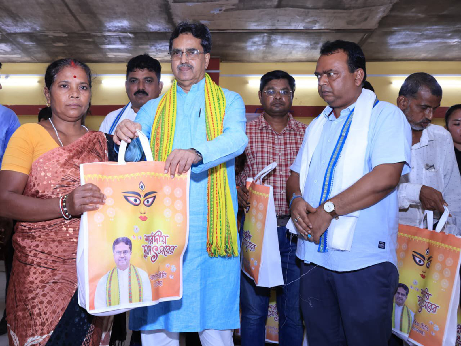 CM Manik Saha distributes saris ahead of Durga Puja (Photo/ANI)