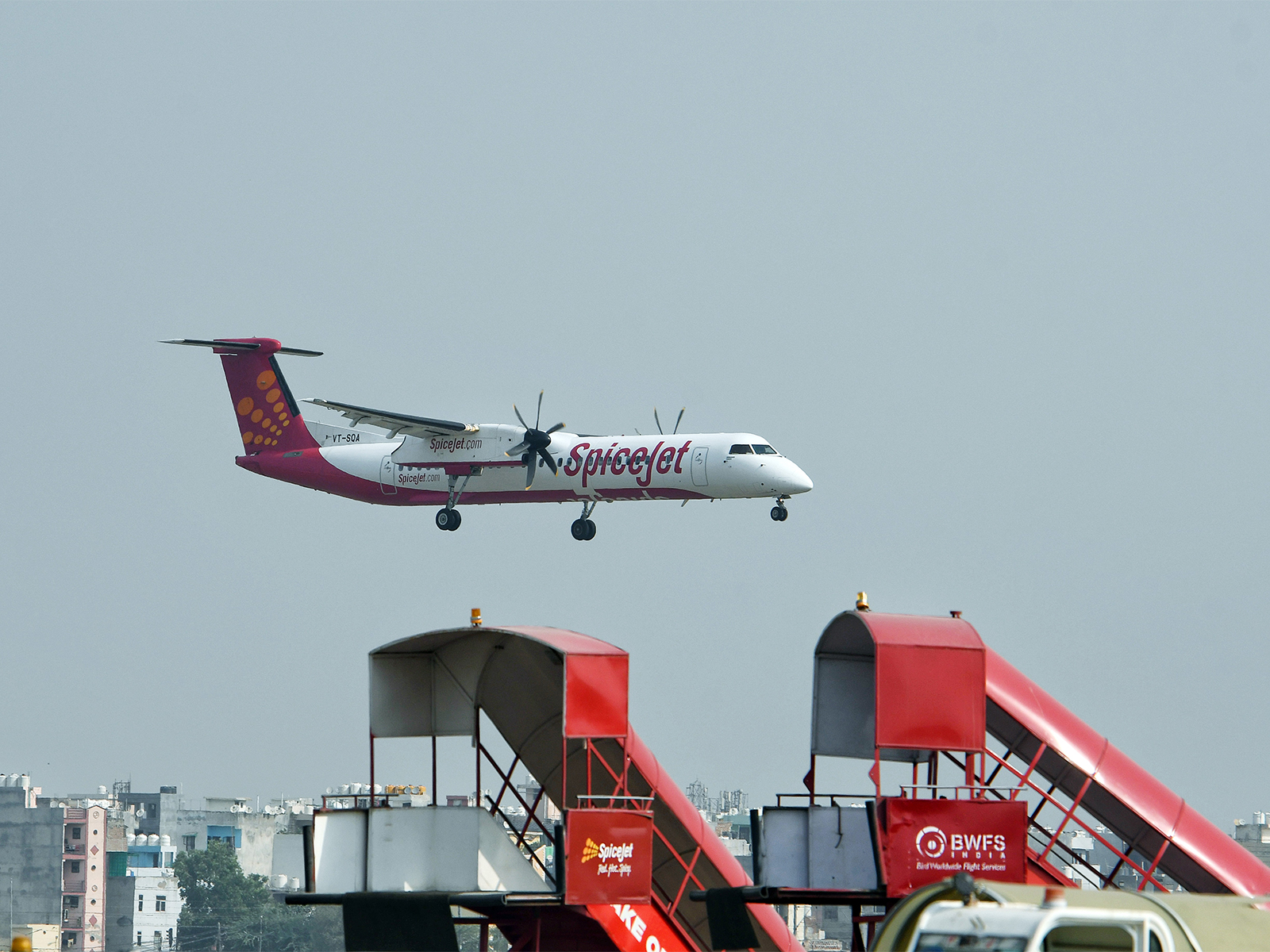 A SpiceJet aircraft seen flying after taking off from the runway at Indira Gandhi International Airport, in New Delhi. (File Photo/ ANI))