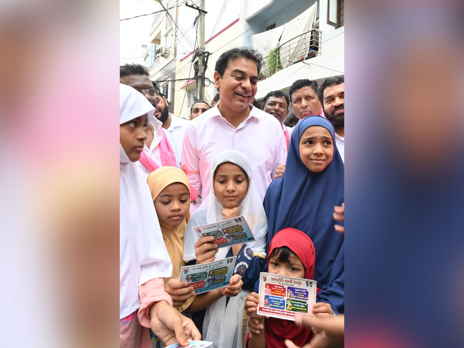 BRS working president KTR along with residents (Photo/ANI)
