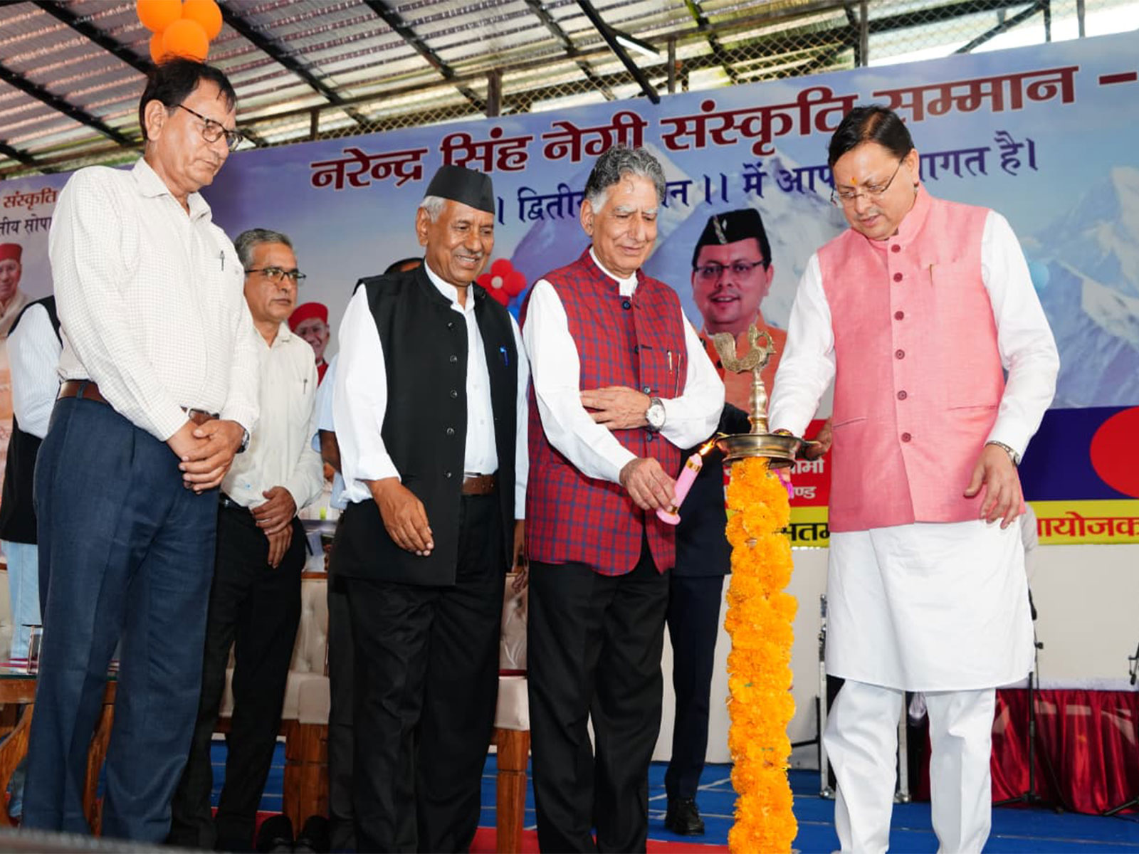 Uttarakhand CM Pushkar Singh Dhami participates in 'Narendra Singh Negi Cultural Award' (Photo/ANI)