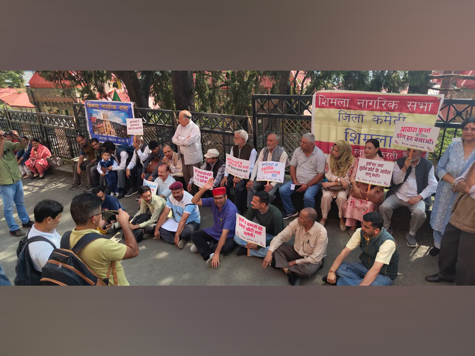 The Shimla Citizens' Forum on Monday staged a protest against the alleged increasing threat posed by stray dogs and monkeys in the city, (Photo/ANI)